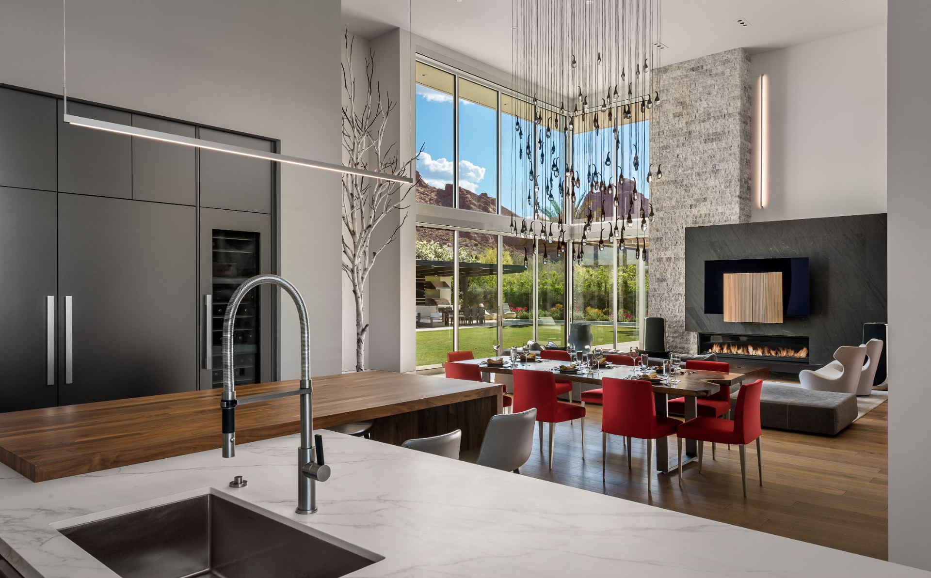 Kitchen opening onto the great room in a Watt Integration project home