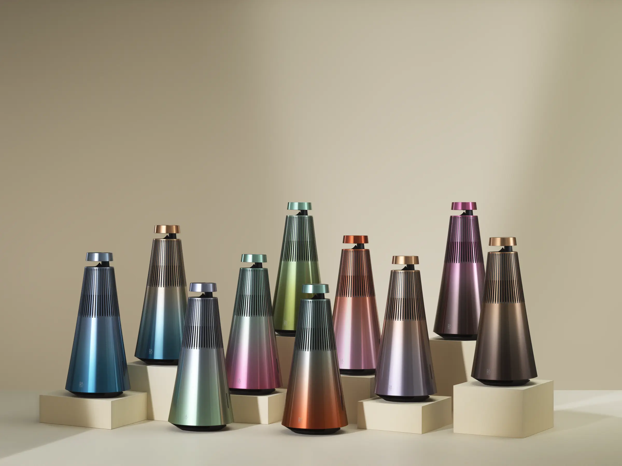 Ten Bang & Olufsen Beosound 2 speakers in Atelier limited-edition finishes, arranged on plinths